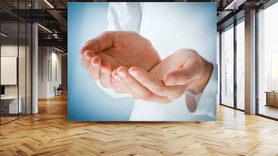 hands in the act of receiving Wall mural