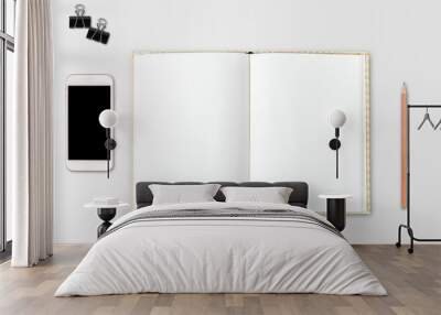 Mobile phone and diary notebook on white table background, Busin Wall mural