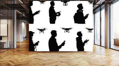 illustration silhouette man holding remote operating drone, bundle set Wall mural