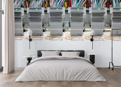 Modern computer programmable embroidery machine in garment industry. Wall mural