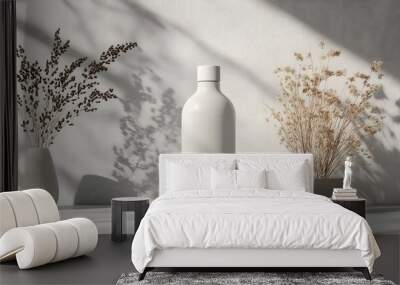 White bottle mockup placed on a light grey surface, with minimalistic decor around Wall mural