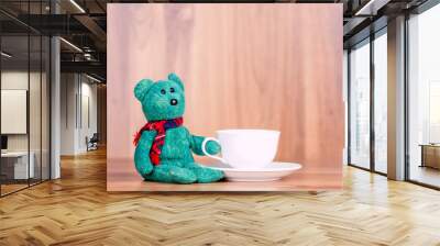 green bear with cup of coffee Wall mural