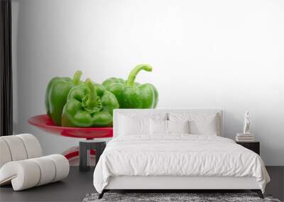 Green Peppers on scales on white background. Wall mural