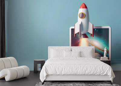 Rocket launch from laptop on office table to fly up in air. Business startup new idea project development, internet marketing strategy growth, future product progress on a website, speed power boost Wall mural