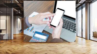 Close up shot of male hands touching blank screen smart phone. Wall mural