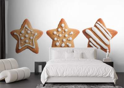 Delicious star-shaped cookies with white icing, perfect for festive celebrations and sweet treats. Wall mural