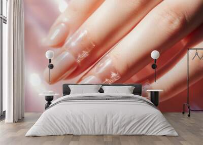 Elegant nude manicure on feminine hand, nail service on peach fuzz background, close-up Wall mural