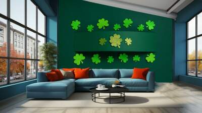 Green Clover Leaves Shamrocks on Green Background. St. Patrick's Day Holiday Concept. Wall mural