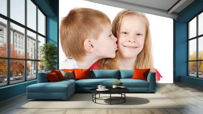 little boy kissing beautiful little girl Wall mural