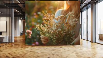 Young woman collects and dries medicinal herbs and flowers on nature sunny background. Herbal alternative medicine for holistic healing, healthy lifestyle concept. Generative ai Wall mural