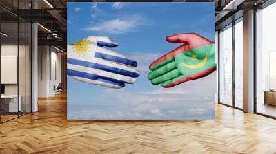 Mauritania and Uruguay country handshaking with flags, consensus concept international co-operation illustration Wall mural