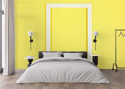 Flat lay pastel colored background with empty picture frame Wall mural