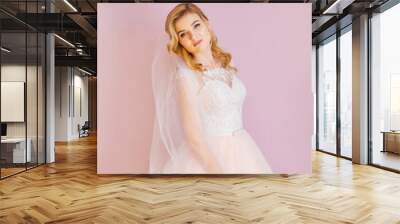 beautiful bride in wedding dress and bridal veil on the backgrou Wall mural