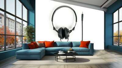 Black headphones on white background with 3,5 mm jack for plug in Wall mural