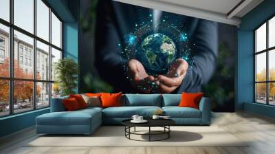 Businessman holding circular economy icon or planet logo on businessman's hands on dark background with space for text or inscriptions, selective focus. front view
 Wall mural