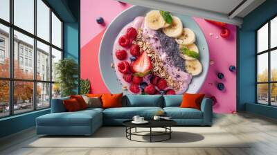 closeup of healthy vegan breakfast. A plate with strawberry mousse, raspberries and bananas on a light pink background
 Wall mural