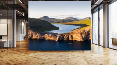 Aerial view from drone of Sorvagsvatn lake on cliffs of Vagar island in sunset time, Faroe Islands, Denmark. Landscape photography Wall mural