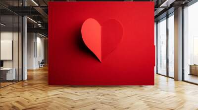 Creative Valentines Day postcard design with red paper heart on red cardboard background. Valentine day and love concept Wall mural