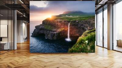 Incredible sunset view of Mulafossur waterfall in Gasadalur village, Vagar Island of the Faroe Islands, Denmark. Landscape photography Wall mural