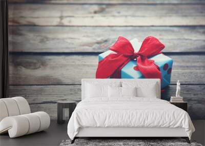 gift box on wooden table as natural background with copyspace Wall mural