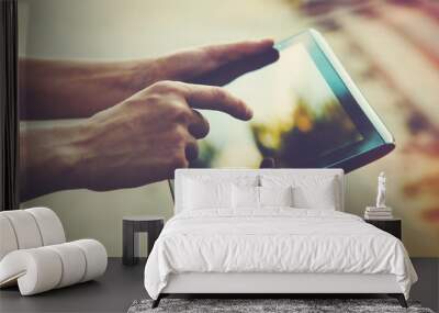 hands holding digital tablet pc Wall mural