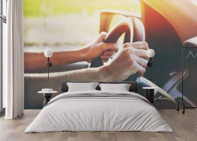 hands on steering wheel driving car Wall mural