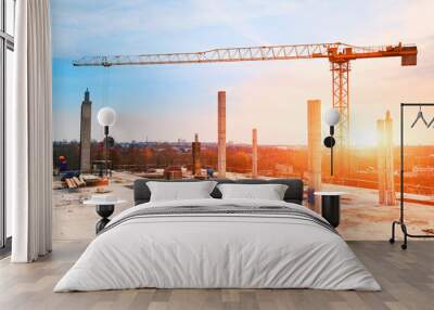 tower crane at construction site in morning sunlight Wall mural