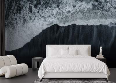 Abstract nature background. Aerial drone view of black sand beach and ocean waves in South Iceland Wall mural