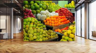 Fresh fruits for sale at night market in Vietnam. Exotic tropical food Wall mural