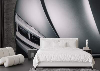 Modern car wrapped in grey color matte vinyl Wall mural