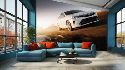 White modern car drive at asphalt road at sunset Wall mural