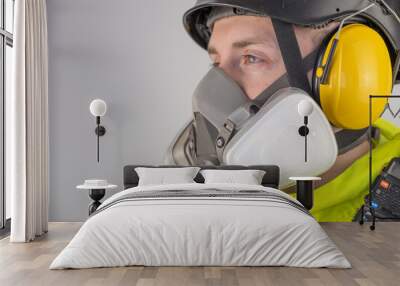 Man in personal protective equipment at work Wall mural