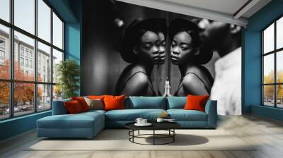 Modern black man and caucasian woman in a town. Wall mural