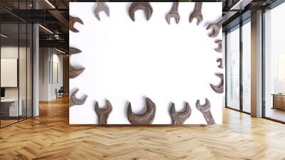 Old rusty stainless steel crescent wrench isolated on white top view Wall mural