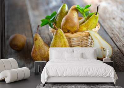 pears on rustic wooden background. autumn harvest with copy space Wall mural