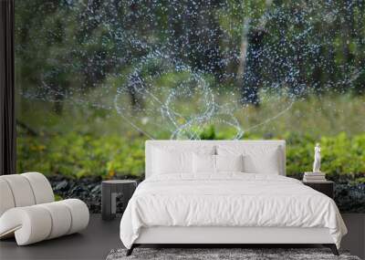 Sprinkler of water with drops Wall mural