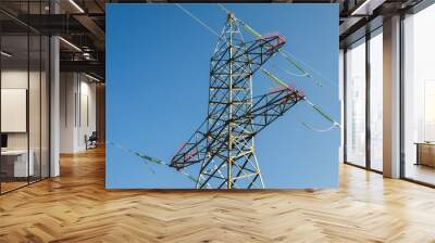 Pylon and transmission power line. High voltage towers with sky background. Wall mural