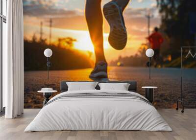 runner runs on the road in healthy outdoors, close up view of legs against sunset background
 Wall mural