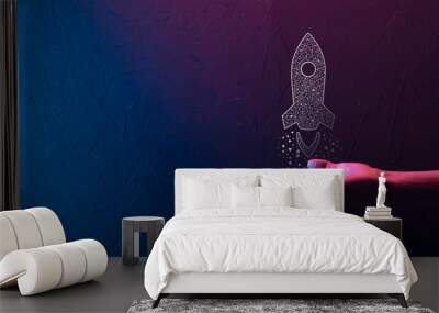 startup business concept, businessman holding tablet and icon rocket is launching and soar flying ou Wall mural