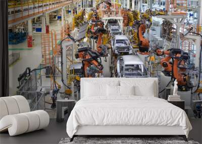 body of car on conveyor top view. Modern Assembly of cars at the plant. The automated build process of the car body Wall mural