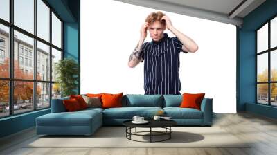 handsome well-groomed 25 year old blond male with tattoos in a striped polo Wall mural