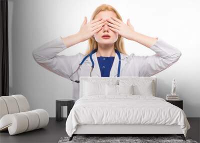 Woman doctor with closed eyes Wall mural