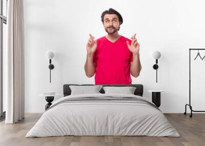 young brunette advertiser man dressed in a red t-shirt with a mockup Wall mural