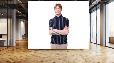 young European blond guy in a striped polo shirt on a white background Wall mural