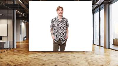 young friendly cute european man with golden hair is dressed in a stylish black and white shirt on a studio background with copy space Wall mural