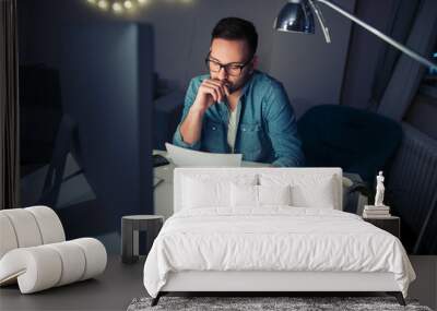 Busy man working at home Wall mural