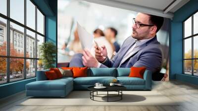 Handsome businessman in office Wall mural