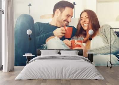 happy young couple at home Wall mural