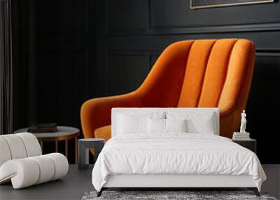 modern comfortable orange velvet armchair in a room with black walls Wall mural