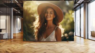 Portrait of happy woman at summer meadow Wall mural